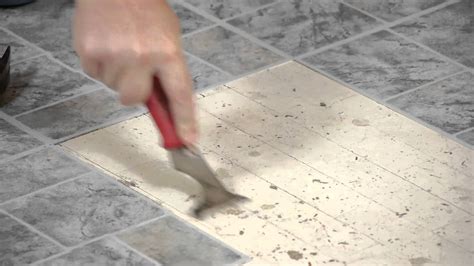 how to remove old floor tile cement